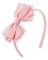 A fashionable and chic look. Our bow headband in luxurious grosgrain ribbon is an adorable addition to any ensemble. 100% Polyester Grosgrain Ribbon; Plastic Headband. Spot Clean. Imported. The Classics Shop.