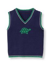 Intarsia-knit turtle with embroidered details is featured on the front of our sweater vest in soft combed cotton. Contrast tipping finishes the perfect layering piece. 100% Combed Cotton. Machine Washable; Imported.