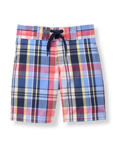 Prep for swim time with standout plaid. Design features front tie and comfortable mesh liner. 65% Cotton/35% Nylon. Elasticized Back Waist. Machine Washable; Imported. Flamingo Cove.