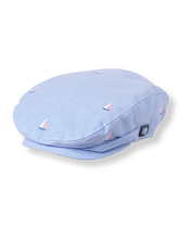 Embroidered sailboats add nautical charm to our cap in light cotton oxford. Features side buckle accents and elasticized back. 100% Cotton Oxford. Fully Lined. Inside Grosgrain Ribbon Trim. Spot Clean; Imported. Madras Manor.
