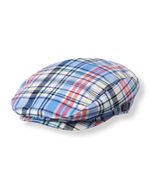 Madras plaid adds standout style to our cap in a light linen blend. Features side buckle accents and elasticized back. 55% Linen/45% Cotton. Fully Lined. Inside Grosgrain Ribbon Trim. Spot Clean; Imported. Madras Manor.