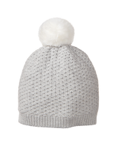 Precious pom-pom accent decorates our soft sweater beanie. Finished with interwoven silver threads. 47% Viscose/29% Cotton/16% Nylon/6% Other Fibers. Fully Lined. Machine Washable; Imported. Snowy Cottage.
