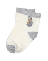 Intarsia-knit penguins accent our comfortable sock. Soft cotton is blended with nylon and spandex for stretch and hold. 48% Cotton/35% Nylon/15% Polyester/2% Spandex. Textured Grips (Sizes Up To 18-24 Months). Machine Washable; Imported. Snowy Cottage.