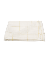 Our light swaddle blanket is made for baby's first moments. Decorated with metallic details. 99% Cotton/1% Other Fibers. Approximately 46" x 46". Machine Washable; Imported. Snowy Cottage.