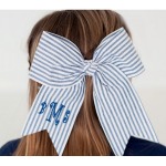 Navy Seersucker Hair Bow ~Add a personal touch to an already picture perfect Seersucker hair bow. Bow features an alligator style clip and is personalized on the left tail. Put your girl's name on a hair bow today. Actually it's perfect for any age!  2.25" Alligator Clip Seersucker Material Monogram Shown: Vine/Red Thread