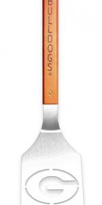 Georgia Bulldogs Sportula ~Georgia sports enthusiasts will love this ultimate display of Georgia Bulldogs Merchandise. The Sportula is a heavy duty stainless steel grilling spatula that is perfectly designed for the Ultimate Tailgater! Go Dawgs!  Unique laser-cut design Heavy-duty stainless steel Hard maple handles with durable brass rivets Convenient bottle opener Custom heat-stamped lettering Dimensions: 18 1/2" x 4"