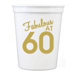 Fabulous At 60 White Stadium Cups ~These stadium cups feature "Fabulous At 60" with gold print. It's the perfect way to decorate for any birthday celebration! Recommended pour: 12 oz