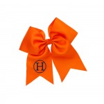 Orange Hair Bow ~Add a personal touch to an already picture perfect solid grosgrain hair bow. Bow features an alligator style clip and is personalized on the left tail. Put your girl's name on a hair bow today.    2.25" Alligator Clip Grosgrain Ribbon Monogram Shown: Navy Thread/Single Classic Font