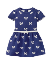 Our bow print dress is perfect for your little belle. Soft and sweet silhouette is finished with ribbon waist. 55% Cotton/25% Viscose/20% Nylon. Button Back. Machine Washable; Imported. Courtyard Blooms.