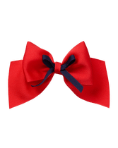 Add a pretty accent to her look with our double bow barrette. Features a metal clip to ensure secure and comfortable wear. Manmade Material. Spot Clean; Imported. Parisian Estate.