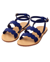 Take chic sunshine steps in our scalloped sandal. Finished with adjustable buckle strap for effortless and comfortable wear. Leather; Manmade Material Sole. Spot Clean; Imported. Sunlight Splash.