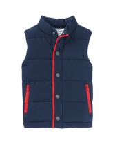 To the shore in our warm puffer vest. Designed with crimson trim and front pockets. 100% Polyester Taffeta. Fully Lined. Snap Button Closure. Machine Washable; Imported. Getaway Grove.