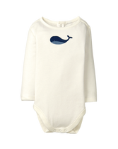 Sweet by the coast in our soft screenprinted whale bodysuit. 100% Cotton Rib. Snaps In Back And Underneath. Machine Wash