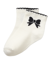 Intarsia-knit bows and scalloped trim make our sock extra adorable. Soft cotton is blended with nylon and spandex for stretch and hold. Cotton/Nylon/Spandex. Textured Grips (Sizes Up To 18-24 Months). Machine Washable; Imported. Black & White Story.