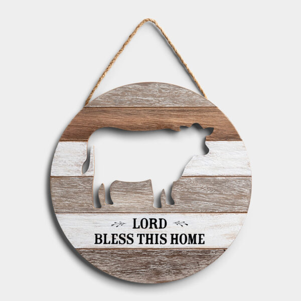 Bless This Home - Wall Art This eye-catching wall art is a perfect way to add a simple prayer to your home decor. The unique die-cut cow will be sure to get a comment from everyone who enters your home.Message:Lord Bless This HomeProduct details:Inspirational wall artSize: 13" x 13" x 3/8"Material: wood composite