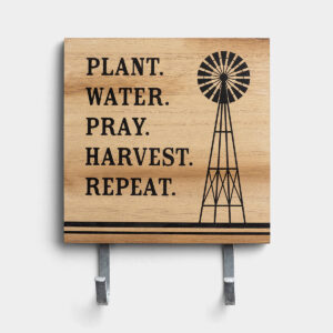 Plant. Water. Pray. - Wall Art with Hooks This eye-catching wall art is a perfect way to express your faith with your home decor and always be able to find your keys! The unique design will be sure to get a comment from everyone who enters your home.Message:Plant. Water. Pray. Harvest. Repeat.Product details:Inspirational wall artSize: 10 3/8" x 8" x 1/4"Material: wood composite