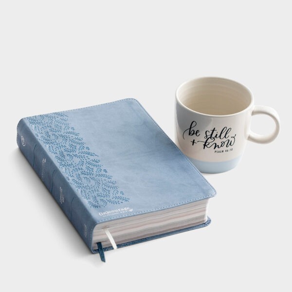 Blue (in)courage Devotional Bible & Be Still Mug - Gift Set This (in)courage Devotional Bible & Be Still Mug gift set is a wonderful way to encourage someone in this uncertain time.With a blue leather-like cover
