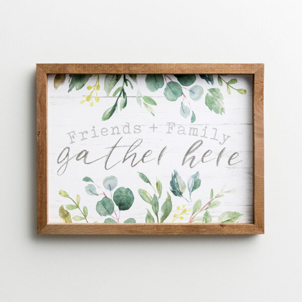 Gather Here - Framed Wall Art Enjoy this beautiful framed wall art piece with a message for your friends and family framed with botanical flourishes.Message:Friends + Familygather hereProduct Details:Inspirational framed wall artSize: 16"W x 12"H x 3/4"DMaterial: Composit woodSawtooth hangerMade in the USAProduct by P. Graham DunnP. Graham Dunn is a family owned and operated business in Dalton