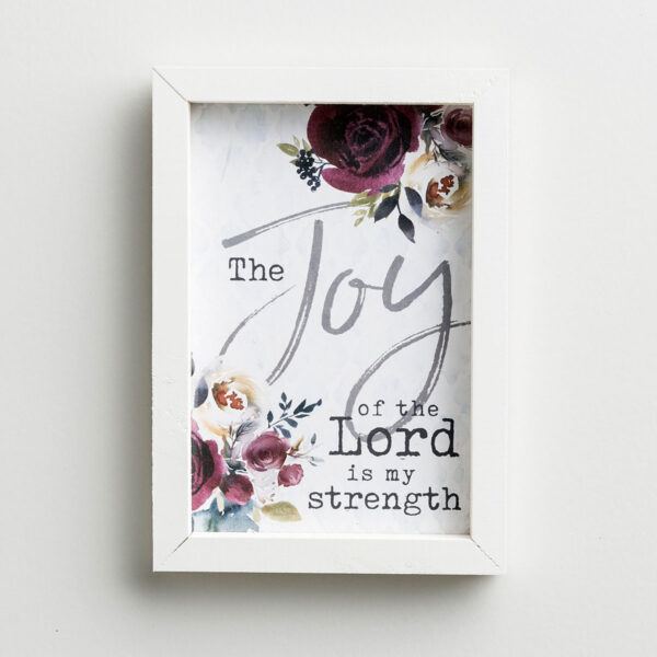 Joy of the Lord - Framed Wall Art This floral wooden block art is a perfect gift or a pop of inspirationfor your own home. Be encouraged that when you focus on Jesus He blesses others through you.Message:be so filled with Jesus you OverflowProduct Details:Inspirational framed wall artSize: 7 1/4"W x 5 7/32"H x 1 1/4"DMaterial: pine woodTabletop displayMade in the USAProduct by P. Graham DunnP. Graham Dunn is a family owned and operated business in Dalton